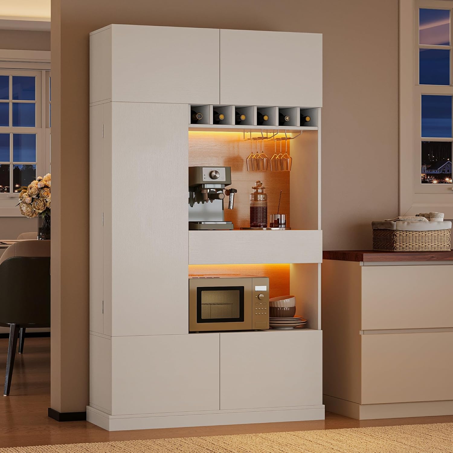 iPormis 69" tall kitchen pantry cabinet with LED lights, microwave stand, wine rack, and door shelves in a modern kitchen setting.