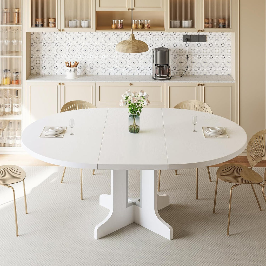 Modern white iPormis 59" round extendable dining table for 4-6 in a bright kitchen setting.