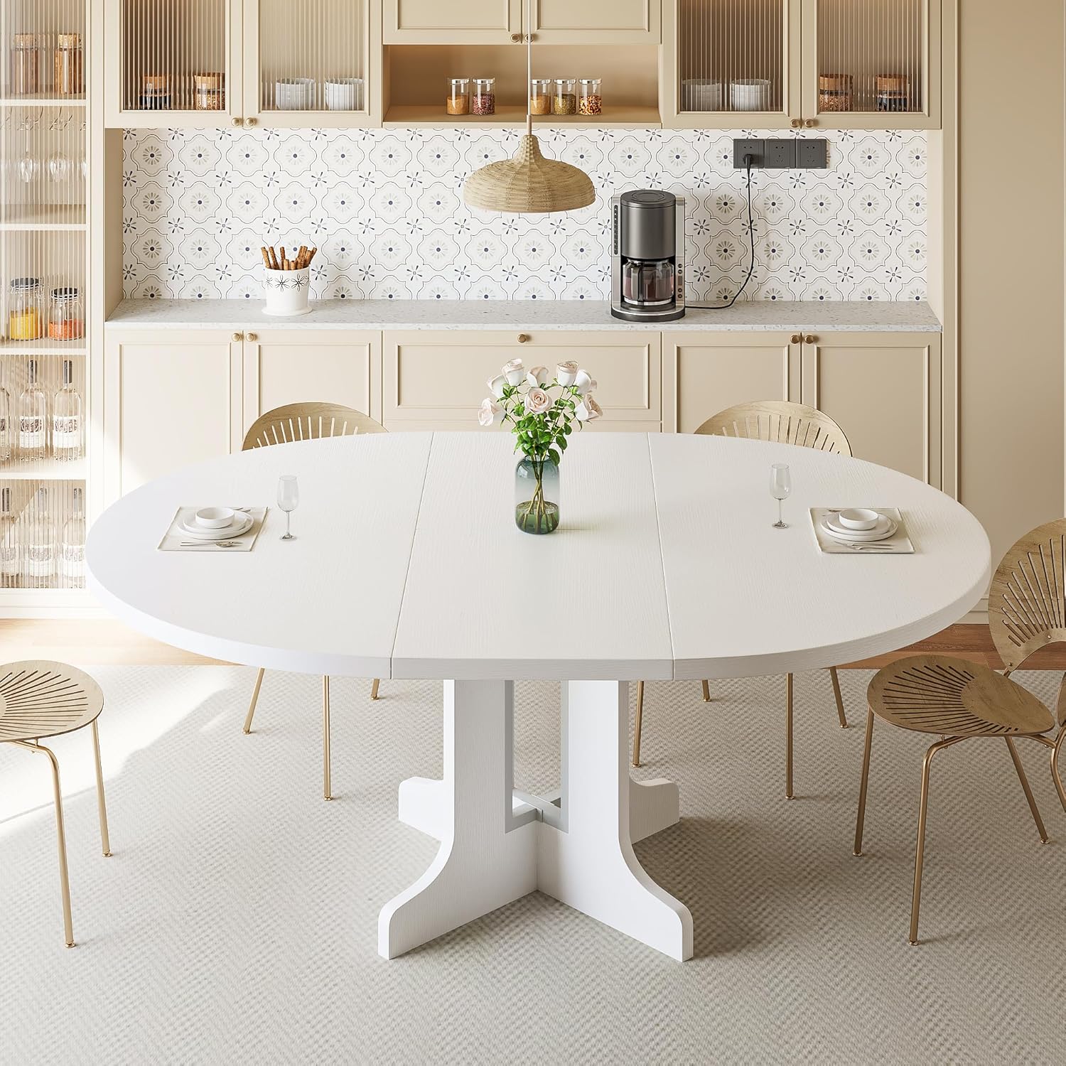 Modern white iPormis 59" round extendable dining table for 4-6 in a bright kitchen setting.